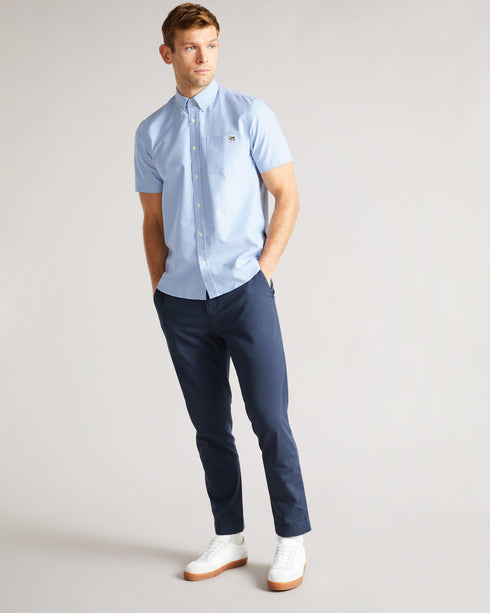 CAPSHO-Shirts-This summer classic is ready to enter your regular rotation. CAPSHO is crafted from a blend of cotton and lyocell — ideal for staying cool in the warmer months. The button-down collar and embroidery detail mean this oxford shirt is smart enough for work, too. By choosing Ted Baker cotton products, you're supporting our investment in the Better Cotton Initiative's mission. This product is sourced via a system of mass balance, and therefore may not contain Better Cotton. Ted Baker menswear col